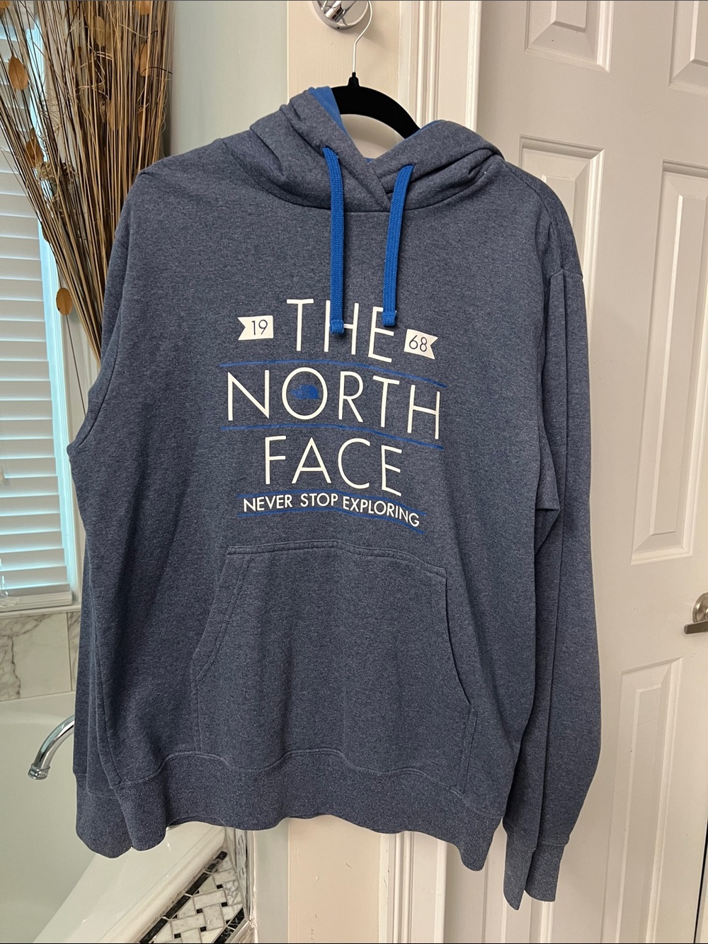 The North Face Men's Navy Blue Pullover Hoodie with Contrast Drawstrings